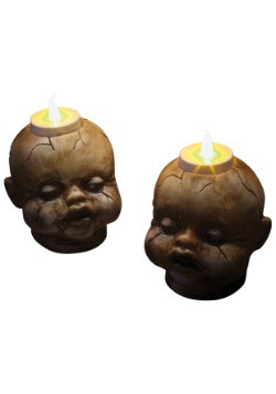Juego de velas de té con cabezas de muñeca