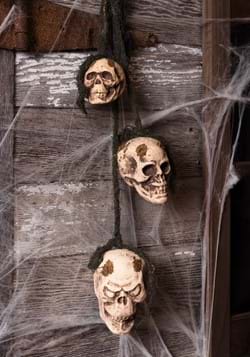 Colgante de calaveras podridas