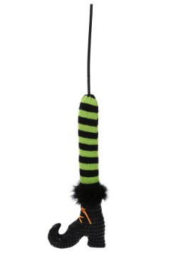 Pierna de bruja verde en un palo