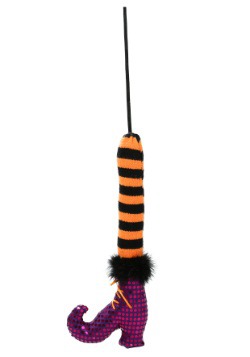 Pierna de bruja morada en un palo